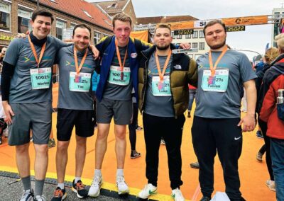 Mitarbeitende der C. Christophel GmbH beim Stadtwerke Lübeck Marathon, Teamgeist, Sport und Engagement im Unternehmen