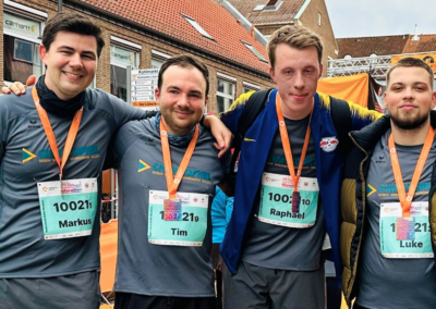 Mitarbeitende der C. Christophel GmbH beim Stadtwerke Lübeck Marathon, Teamgeist, Sport und Engagement im Unternehmen